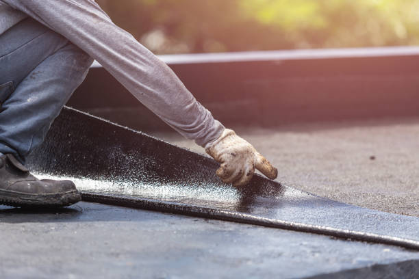 Professional Emergency Waterproofing technician working in Marilla, NY
